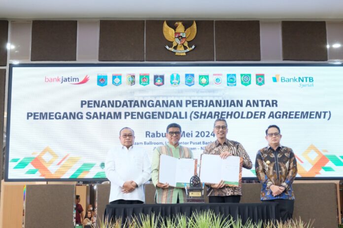 Kerjasama Bank NTB Syariah dengan Bank Jatim (Jawa Timur) (EKbis NTB/bul)