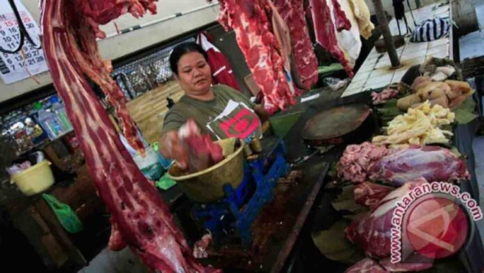 Pedagang daging (ekbisntb.com/ant)
