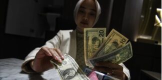 Bank Indonesia Pangkas Batas Maksimal Pembelian Dolar AS, Efek Perang di Timur Tengah Bank Indonesia Pangkas Batas Maksimal Pembelian Dolar AS, Efek Perang di Timur Tengah